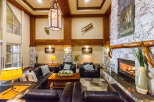 Step into a cozy lodge-style living space, perfect for relaxing and entertaining.
