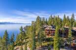 Nestled amidst towering pines, this stunning property offers breathtaking views of the lake and surrounding mountains.