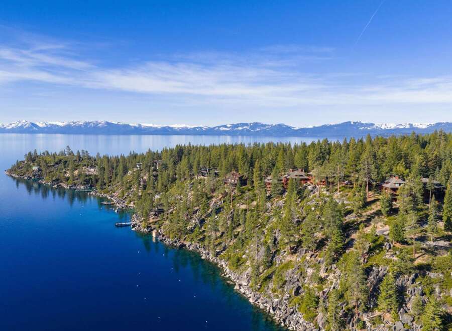 Discover the epitome of luxury living with this stunning property, nestled along the serene shoreline.