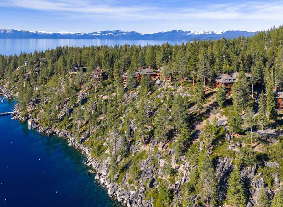 Nestled along the pristine shoreline, this stunning property offers unparalleled views of the lake and surrounding mountains.