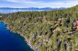 Nestled along the pristine shoreline, this stunning property offers unparalleled views of the lake and surrounding mountains.