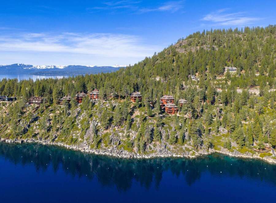 Nestled along the serene shoreline, this stunning property offers unparalleled views and luxurious living.