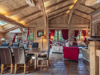 Step into rustic elegance with this stunning chalet-style home.