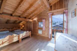 Experience the charm of this cozy wooden cabin, perfect for a mountain getaway.