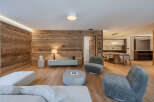 This stunning property boasts a modern interior design with a warm and inviting atmosphere.