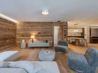 This stunning property boasts a modern interior design with a warm and inviting atmosphere.