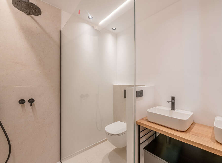 Step into a modern oasis with this stunning bathroom design.