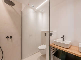 Step into a modern oasis with this stunning bathroom design.