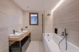 This modern bathroom features a sleek design with a minimalist aesthetic.