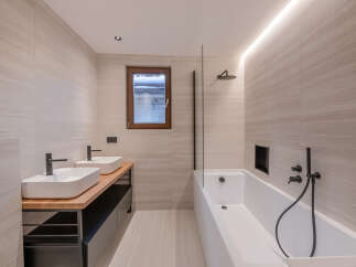 This modern bathroom features a sleek design with a minimalist aesthetic.