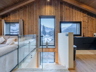Experience the epitome of luxury living in this stunning property, boasting a modern design with a touch of rustic charm.