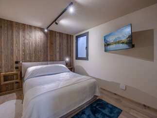 Experience the epitome of comfort in this stunning bedroom.