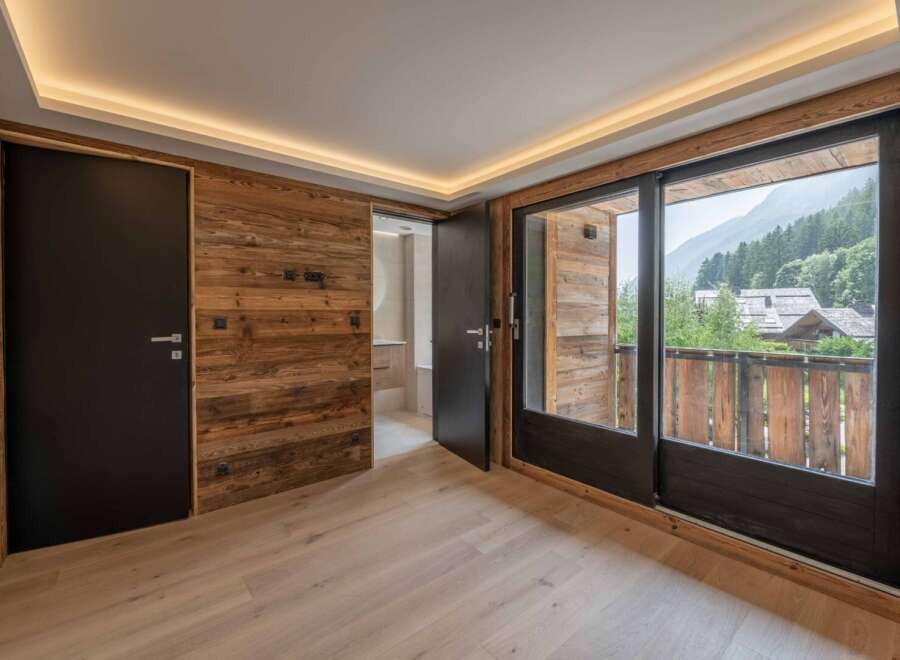 Experience the charm of this stunning property, featuring a beautifully designed interior with natural wood accents.