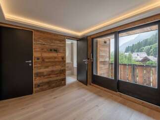 Experience the charm of this stunning property, featuring a beautifully designed interior with natural wood accents.