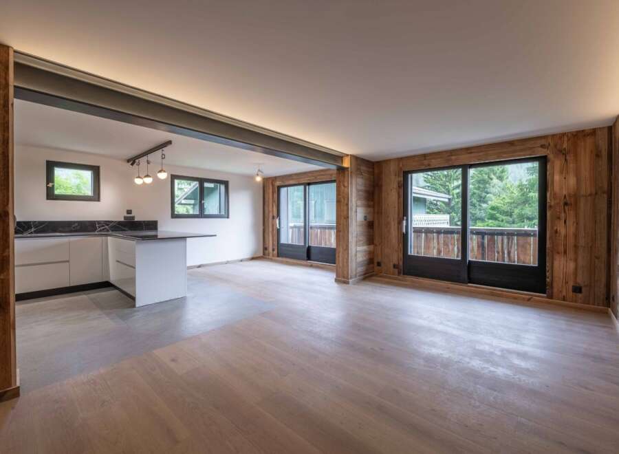 This stunning property boasts a modern kitchen with sleek countertops and ample storage.