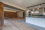 This stunning modern kitchen boasts a sleek design with high-end finishes.