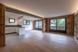 This stunning property boasts a modern kitchen with sleek countertops and ample storage.