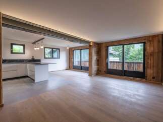 This stunning property boasts a modern kitchen with sleek countertops and ample storage.