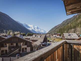 Experience breathtaking mountain views from this charming property.