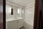 Step into this well-maintained bathroom, featuring a clean and bright aesthetic.
