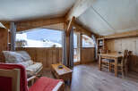 Experience the charm of this cozy ski chalet, perfect for a mountain getaway.