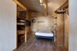 Discover the charm of this cozy wooden cabin, perfect for a mountain getaway.