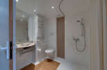 Step into this modern bathroom, designed with accessibility in mind.