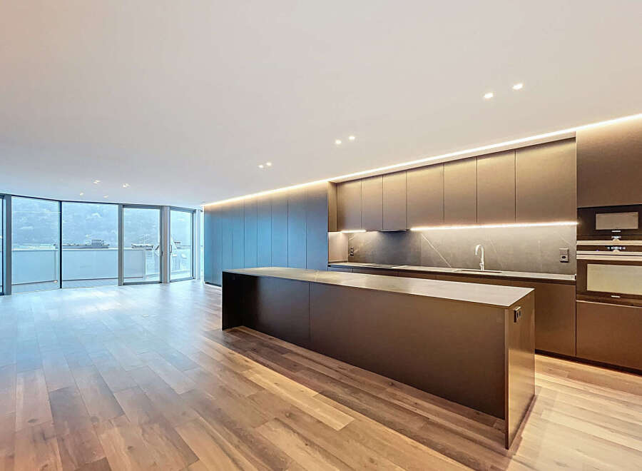 Experience modern luxury in this stunning kitchen! Featuring sleek cabinetry, a spacious island, and top-of-the-line appliances, this space is perfect for both cooking and entertaining.