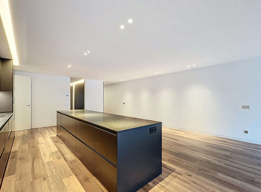 Discover modern elegance in this stunning kitchen! Featuring sleek cabinetry, a spacious island, and recessed lighting, this space is perfect for both cooking and entertaining.