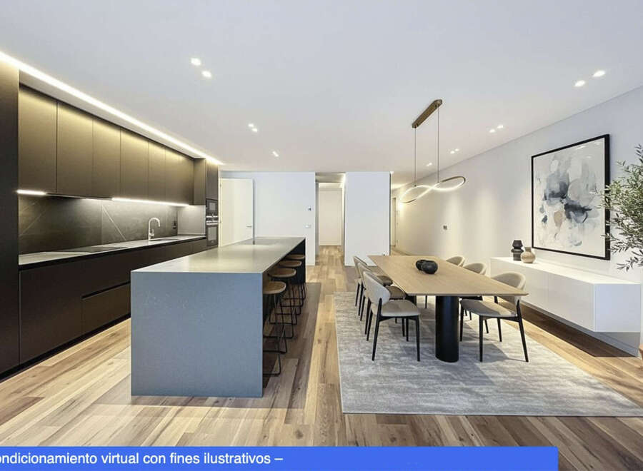 Experience modern luxury in this stunning property, featuring a sleek kitchen with a large island and high-end appliances.