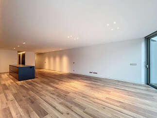 Discover modern elegance in this stunning property featuring a sleek, open-plan design.