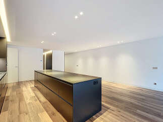 Discover modern elegance in this stunning kitchen! Featuring sleek cabinetry, a spacious island, and recessed lighting, this space is perfect for both cooking and entertaining.