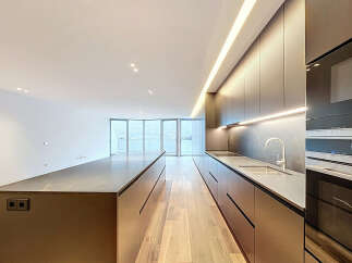 Experience modern luxury in this stunning kitchen.