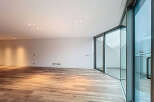 Experience modern living in this stunning property, featuring expansive windows that flood the space with natural light.