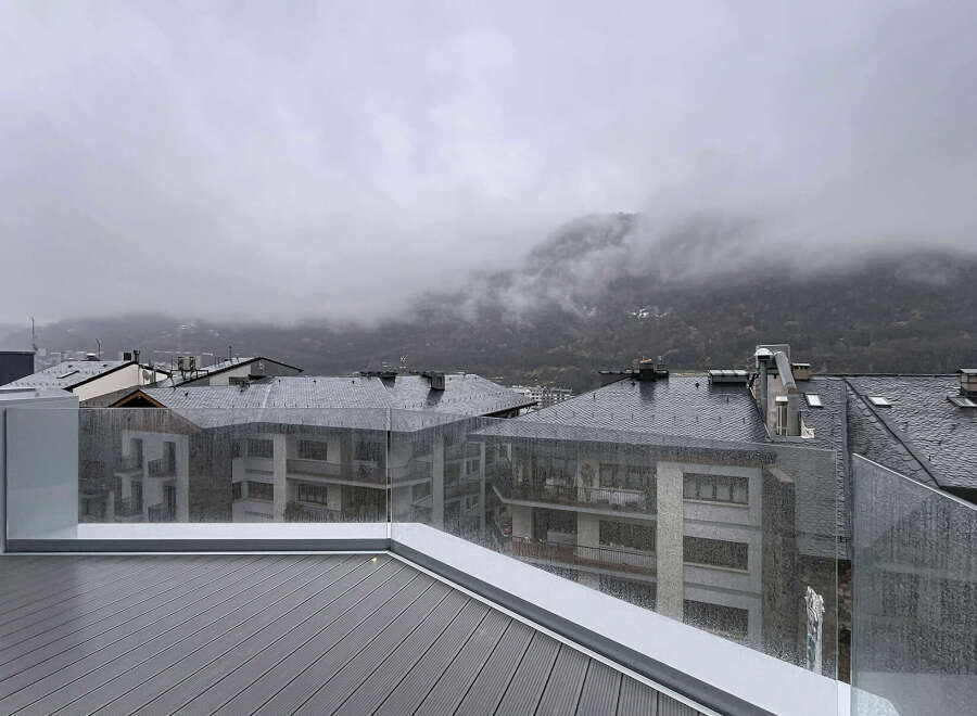 Enjoy breathtaking mountain views from this modern property.