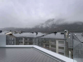 Enjoy breathtaking mountain views from this modern property.