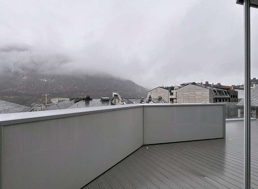 Enjoy breathtaking mountain views from this modern property.