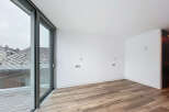Discover the elegance of this modern property, featuring expansive windows that flood the space with natural light.