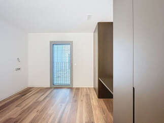 Discover the elegance of this modern property, featuring stunning hardwood floors that flow throughout the space.
