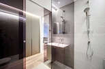 Step into modern luxury with this stunning bathroom design.