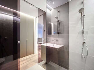 Step into modern luxury with this stunning bathroom design.