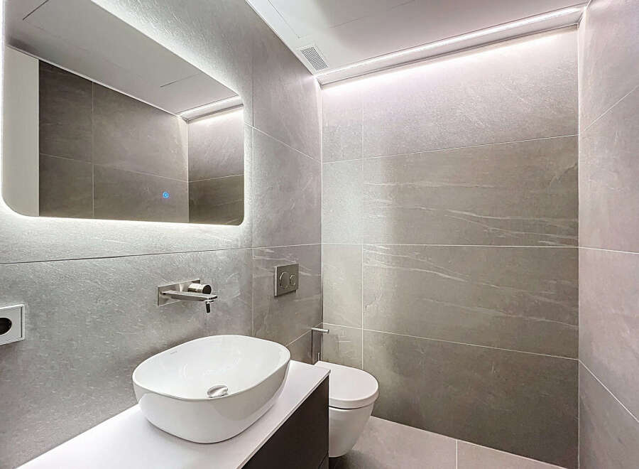 Step into a modern oasis with this stunning bathroom design.