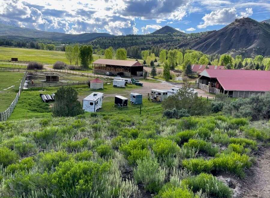 Discover the charm of this stunning ranch property, nestled amidst breathtaking mountain views.