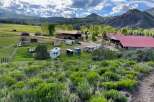 Discover the charm of this stunning ranch property, nestled amidst breathtaking mountain views.