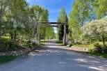 Welcome to the Lazy O Ranch, a stunning property with a grand entrance.