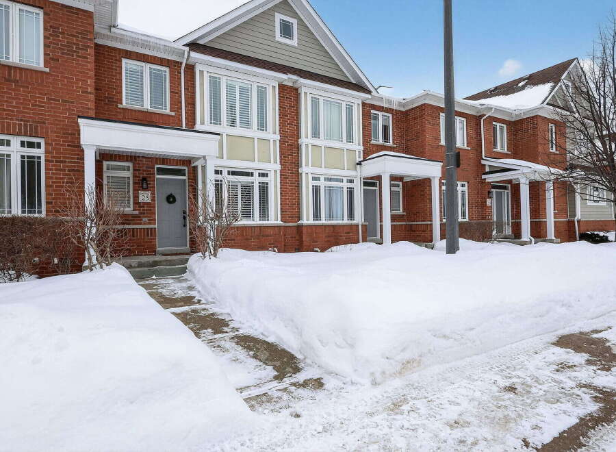 This stunning townhouse offers a blend of modern living and classic charm.