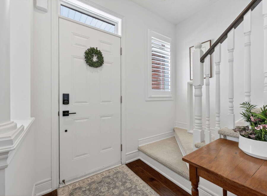 Step into this inviting entryway, showcasing a bright and airy ambiance.