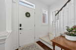 Step into this inviting entryway, showcasing a bright and airy ambiance.