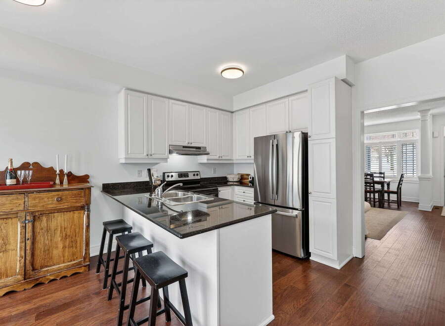 This stunning kitchen boasts modern design and functionality.