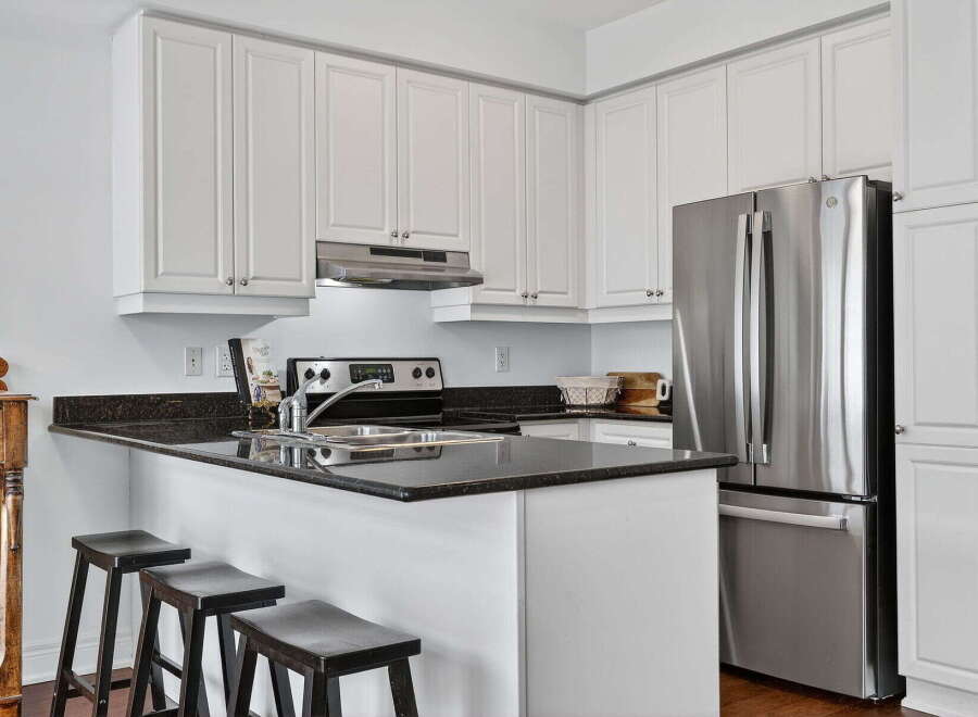This stunning kitchen boasts modern design and functionality.
